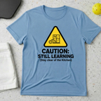 Caution still learning, stay clear of the kitchen T-Shirt