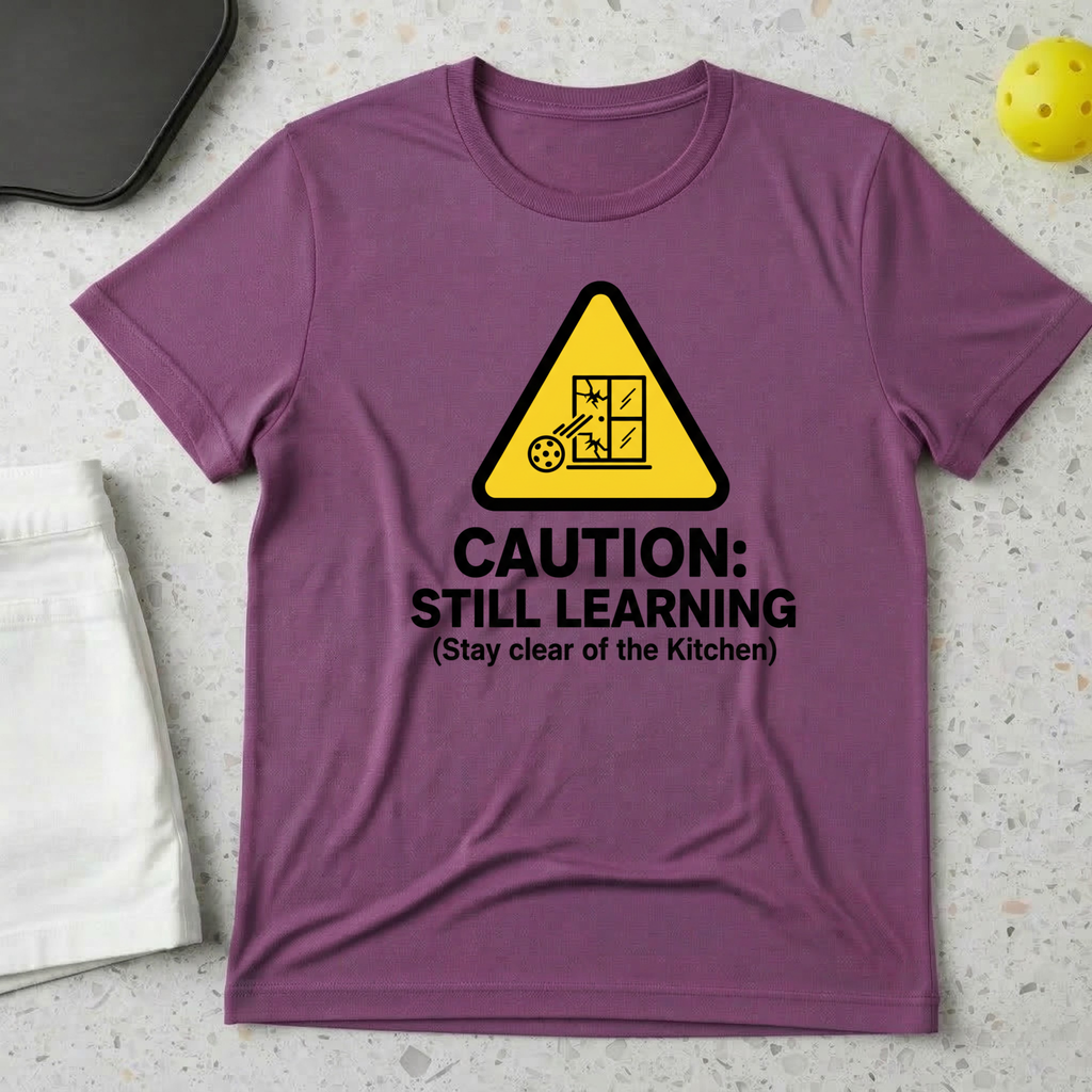 Caution still learning, stay clear of the kitchen T-Shirt